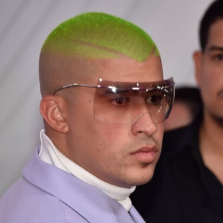 close up of bad bunny with neon green buzzcut