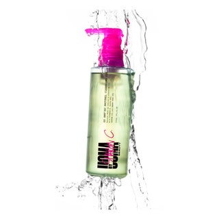 UOMA by Sharon C. Go Awf Au Naturel Cleansing Oil on white background